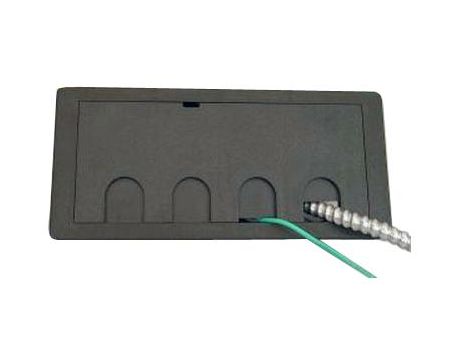 Four individual ports separate cables, keeping them neatly organized